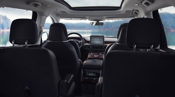 The interior of a 2024 Lincoln Aviator® SUV from behind the second row | Allan Vigil Lincoln, Inc. in Morrow GA
