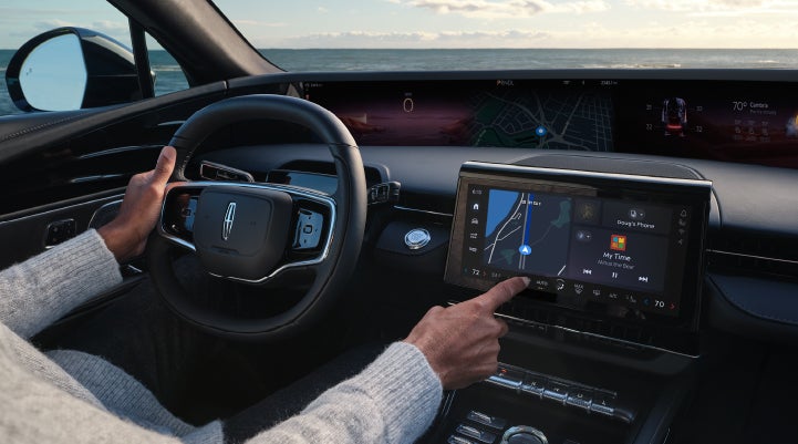 The driver of a 2024 Lincoln Nautilus® SUV interacts with the new Lincoln Digital Experience. | Allan Vigil Lincoln, Inc. in Morrow GA