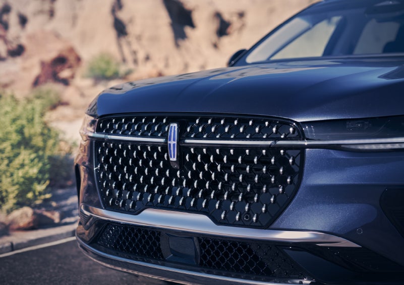 The stylish grille of a 2024 Lincoln Nautilus® SUV sparkles in the sunlight. | Allan Vigil Lincoln, Inc. in Morrow GA
