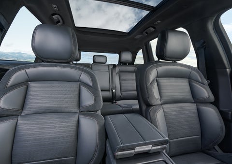The spacious second row and available panoramic Vista Roof® is shown. | Allan Vigil Lincoln, Inc. in Morrow GA