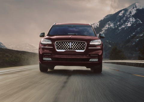 A 2024 Lincoln Aviator® SUV is shown in the Diamond Red exterior color. | Allan Vigil Lincoln, Inc. in Morrow GA
