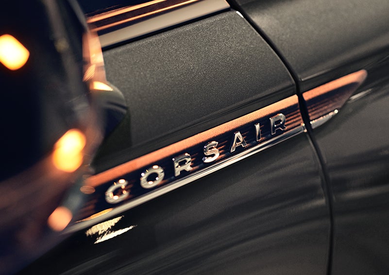 The stylish chrome badge reading “CORSAIR” is shown on the exterior of the vehicle. | Allan Vigil Lincoln, Inc. in Morrow GA