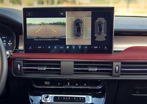 The driver of a 2024 Lincoln Corsair® SUV is shown selecting the drive mode. | Allan Vigil Lincoln, Inc. in Morrow GA