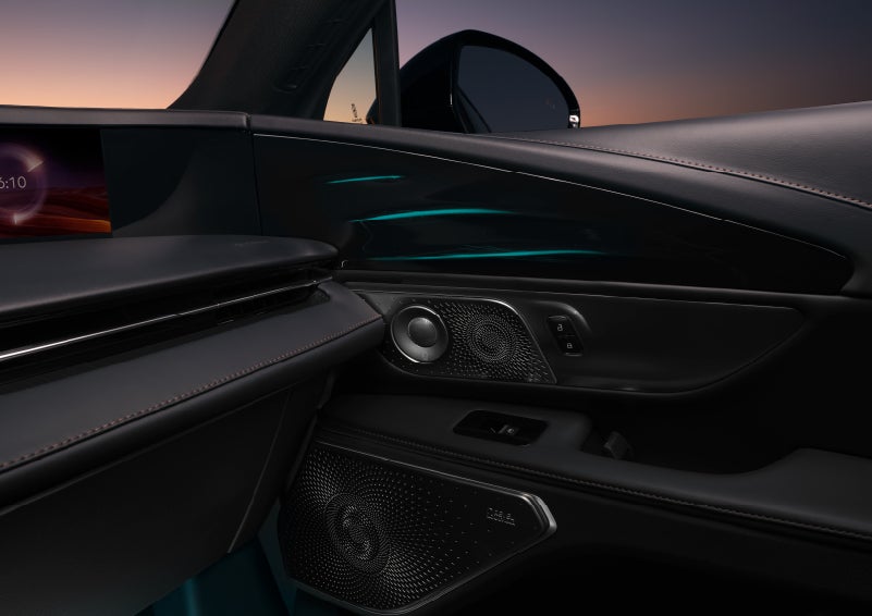 Selectable ambient lighting glows in the passenger door panel. | Allan Vigil Lincoln, Inc. in Morrow GA