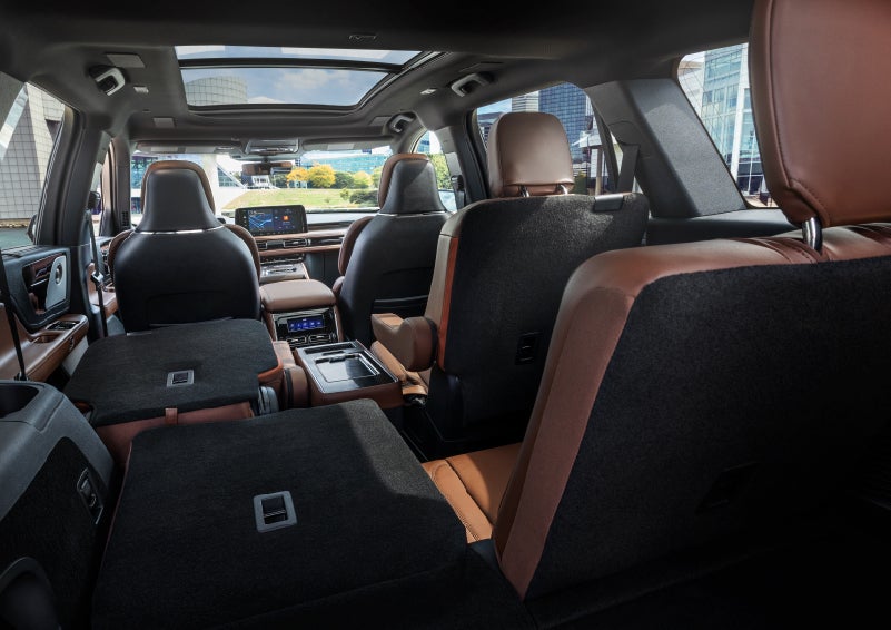 The interior of the 2025 Lincoln Aviator® SUV is shown with two seats folded down for added space. | Allan Vigil Lincoln, Inc. in Morrow GA