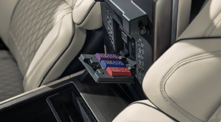 Digital Scent cartridges are shown in the diffuser located in the center arm rest. | Allan Vigil Lincoln, Inc. in Morrow GA