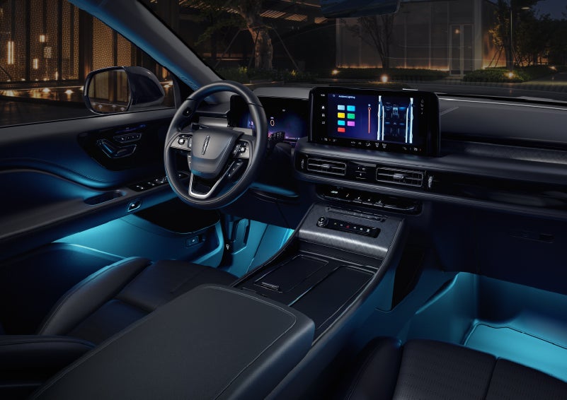 Deep blue ambient lighting glows from various places within a 2026 Lincoln Aviator® SUV. | Allan Vigil Lincoln, Inc. in Morrow GA