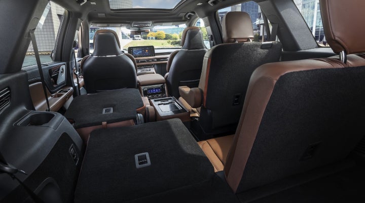 One side of the PowerFold® third-row seat and a second-row seat are folded forward in the 2026 Lincoln Aviator® SUV. | Allan Vigil Lincoln, Inc. in Morrow GA