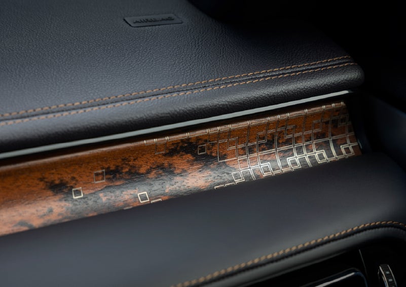 A close-up shot of the 2026 Lincoln Aviator® dashboard with unique black and brown accents and brown stitching. | Allan Vigil Lincoln, Inc. in Morrow GA