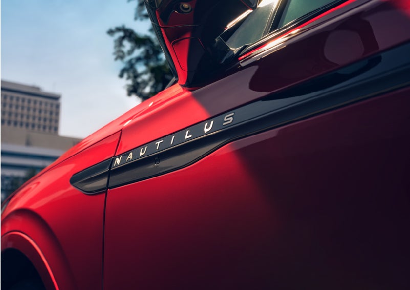 A side badge on the passenger door reads Nautilus. | Allan Vigil Lincoln, Inc. in Morrow GA