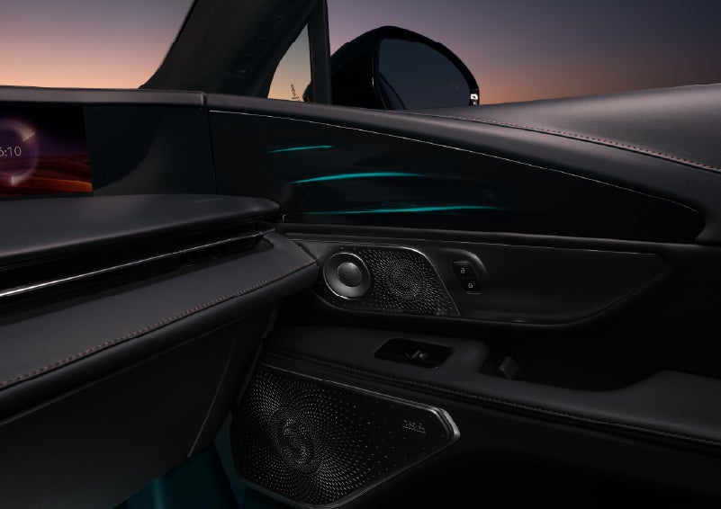 Selectable ambient lighting glows in the passenger door panel. | Allan Vigil Lincoln, Inc. in Morrow GA