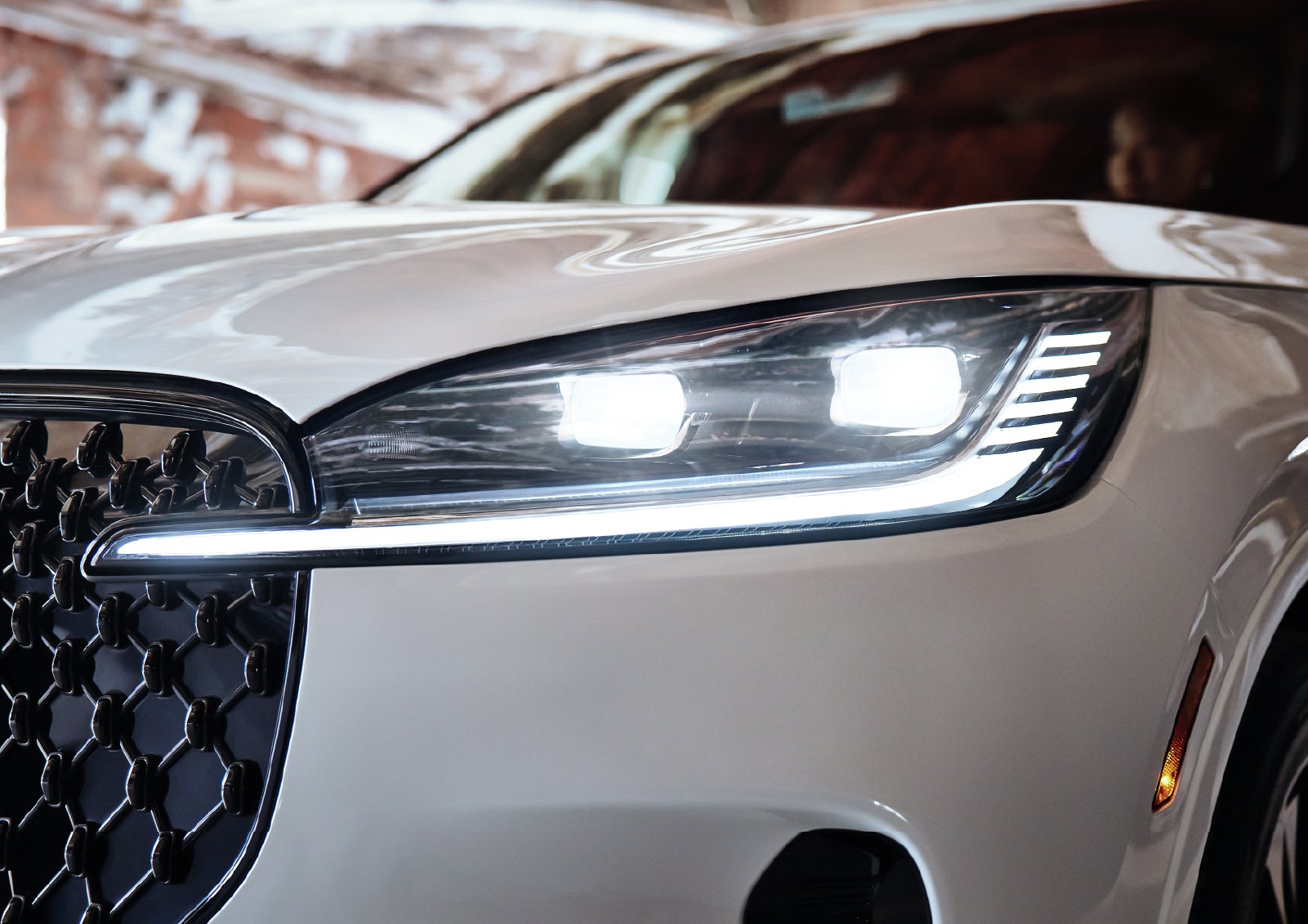 A close-up of a headlamp on the 2027 Lincoln Aviator® SUV is shown. | Allan Vigil Lincoln, Inc. in Morrow GA